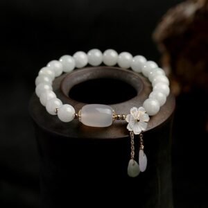 712218302712.jpg Shell flower jade water drop bracelet